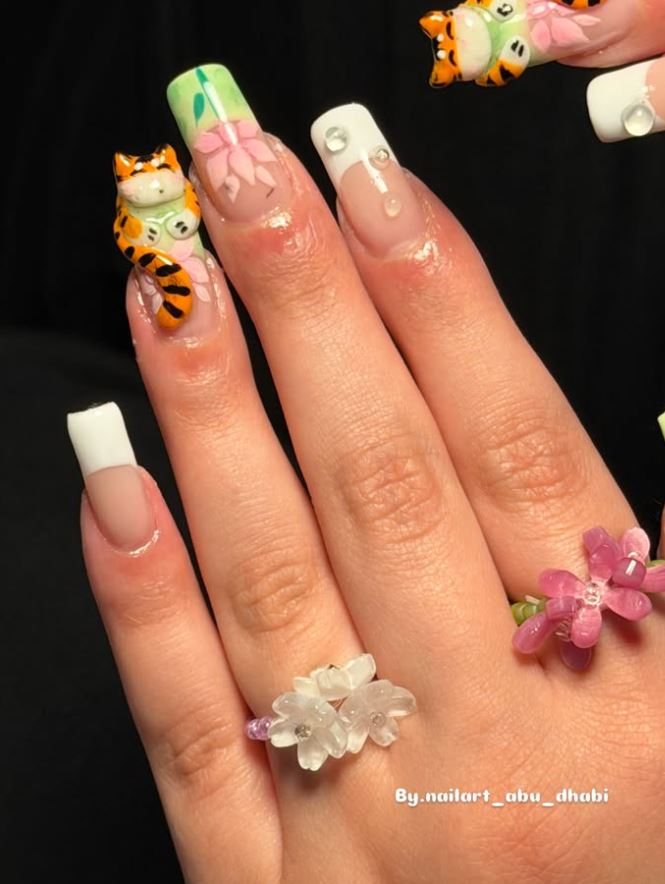 Square nails with hand-modelled tiger and flower charms